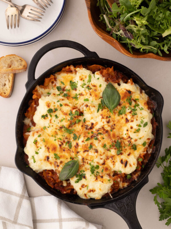 Skillet lasagna in a cast iron skillet.