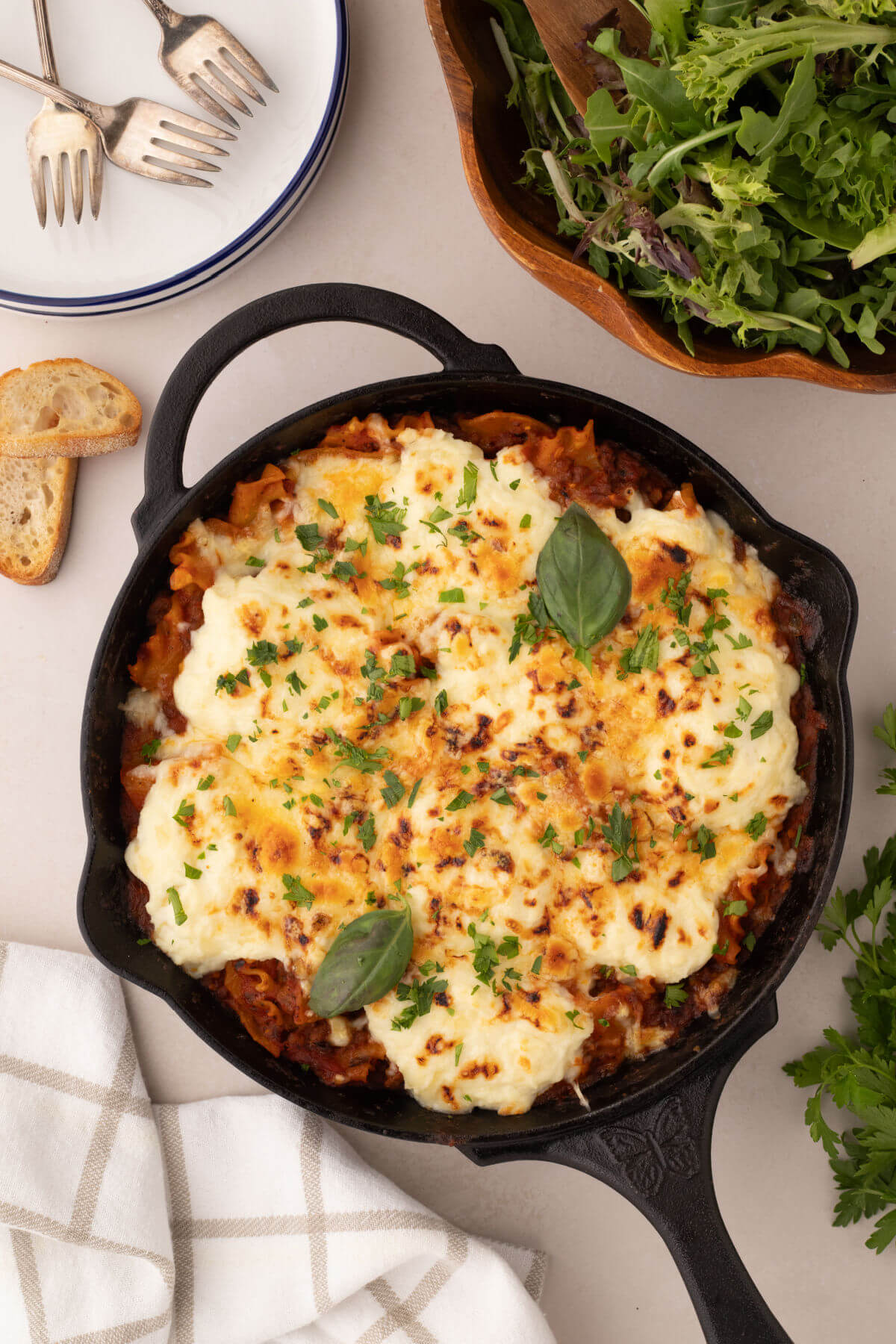 Skillet lasagna in a cast iron skillet.