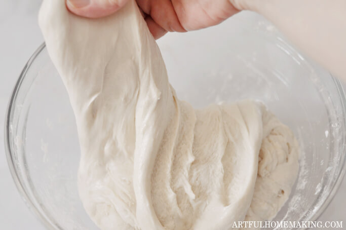 stretching and folding sourdough bread