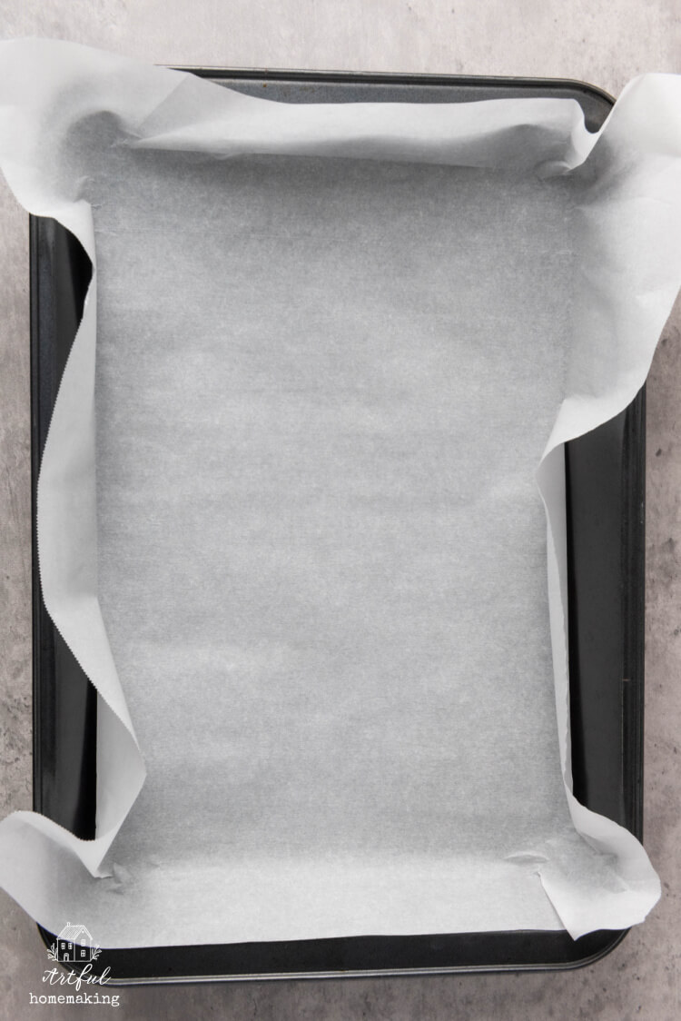 parchment paper spread out on a baking sheet