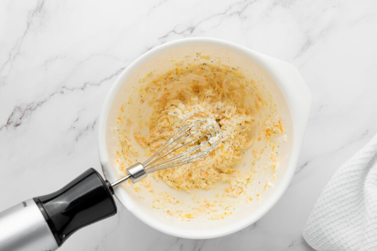 mixing up the ingredients for a cheese ball