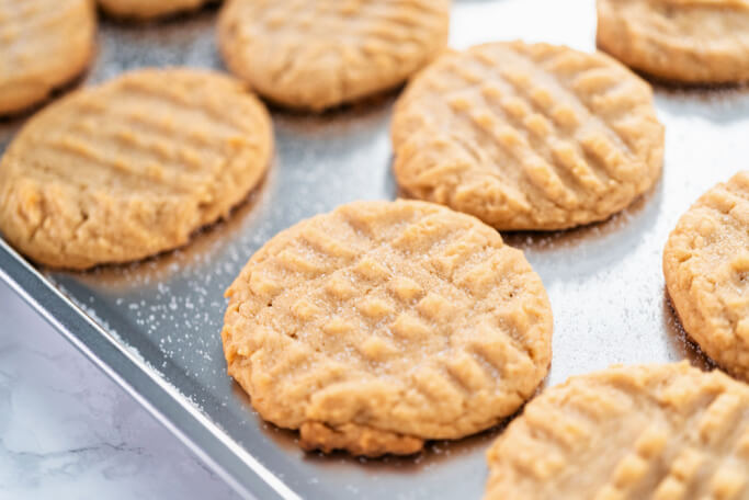 peanut butter cookies on a baking sheet