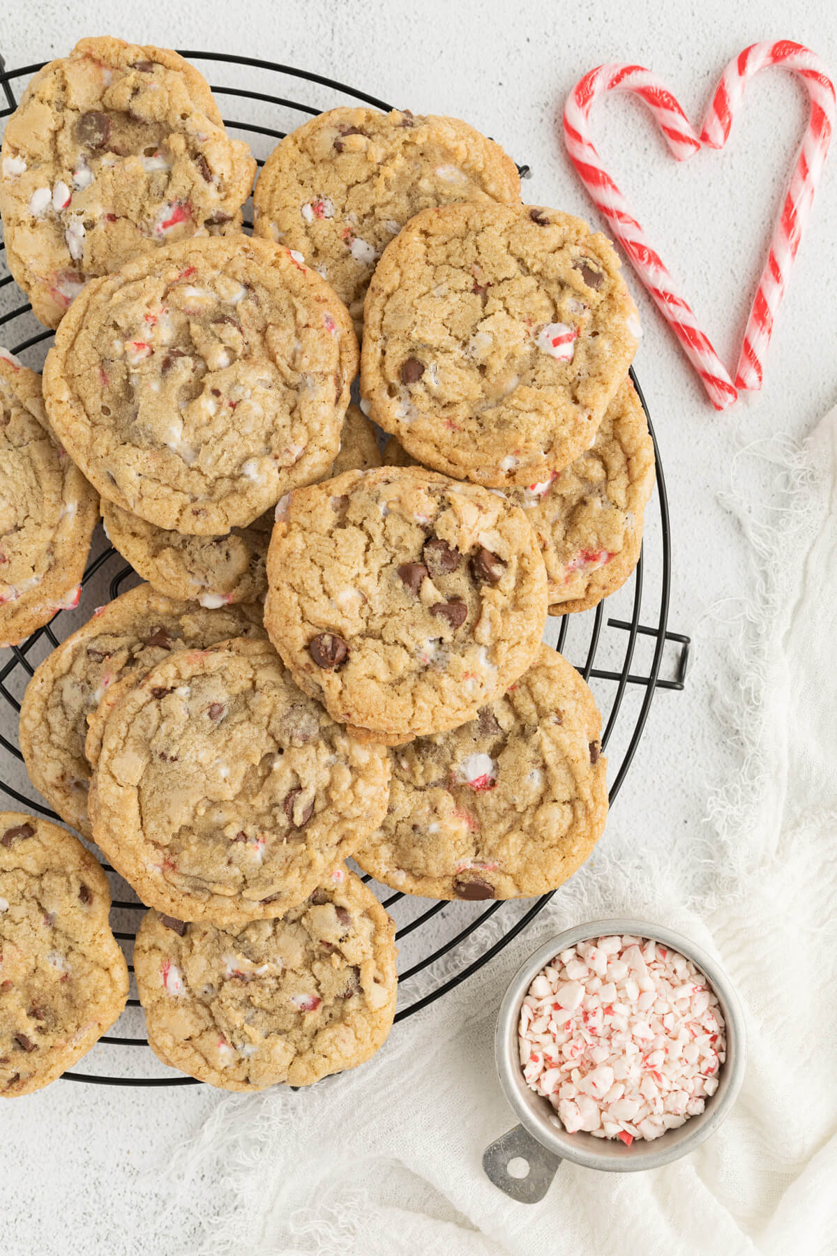 top down view of peppermint chocolate chip cookies on a round wire cooling rack