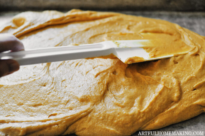 pumpkin bar batter in jelly roll pan