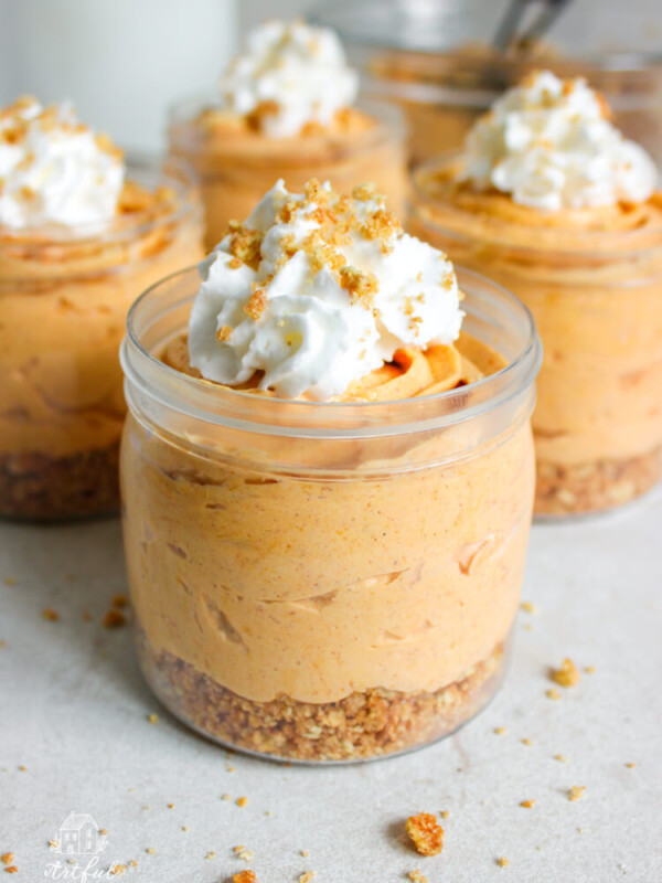 no bake pumpkin cheesecake cups on countertop