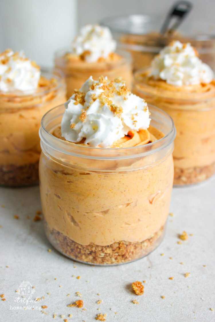 no bake pumpkin cheesecake cups on countertop