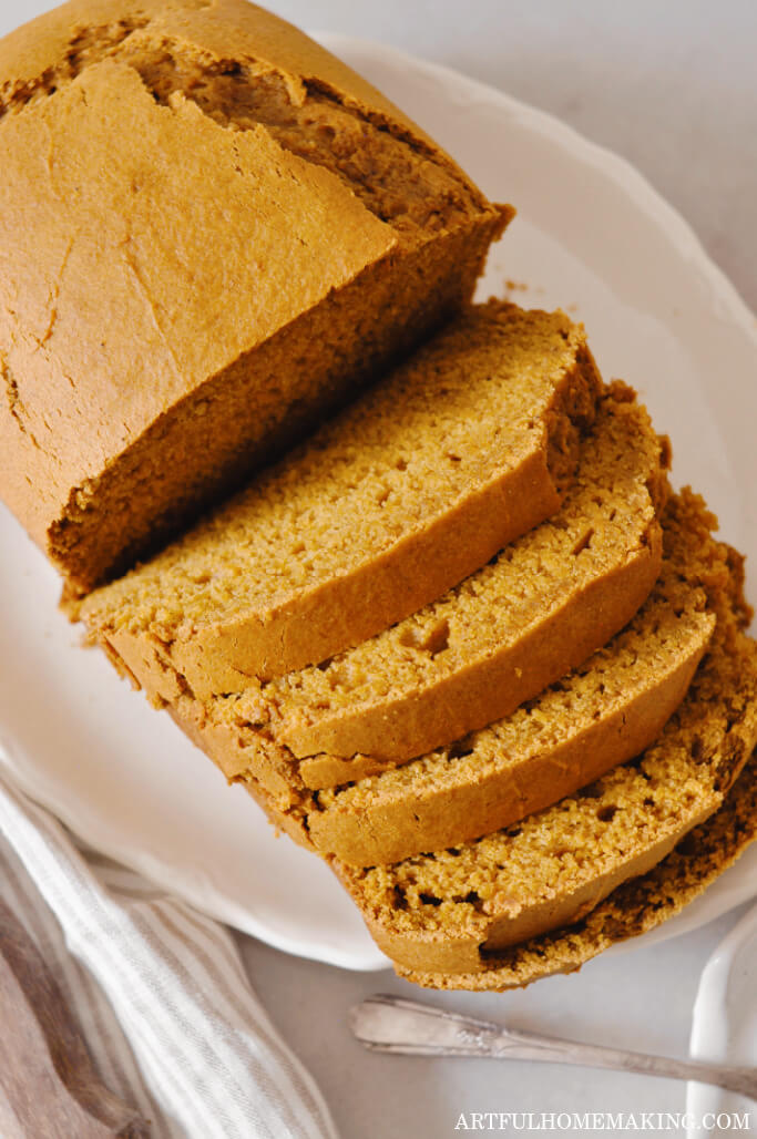 sourdough pumpkin bread on white platter