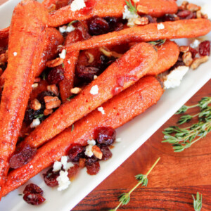 white rectangular platter with roasted carrots