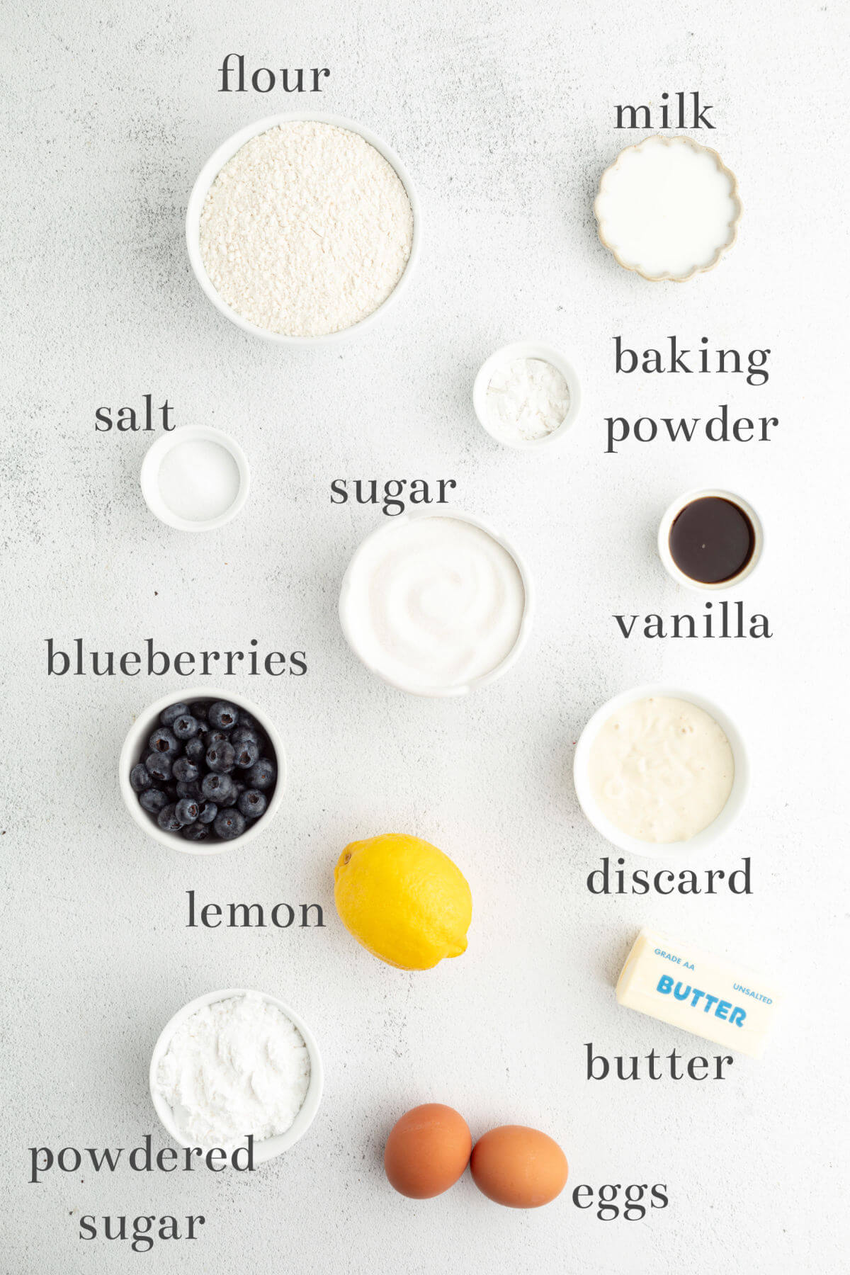 Ingredients in small bowls with text overlay naming each ingredient.
