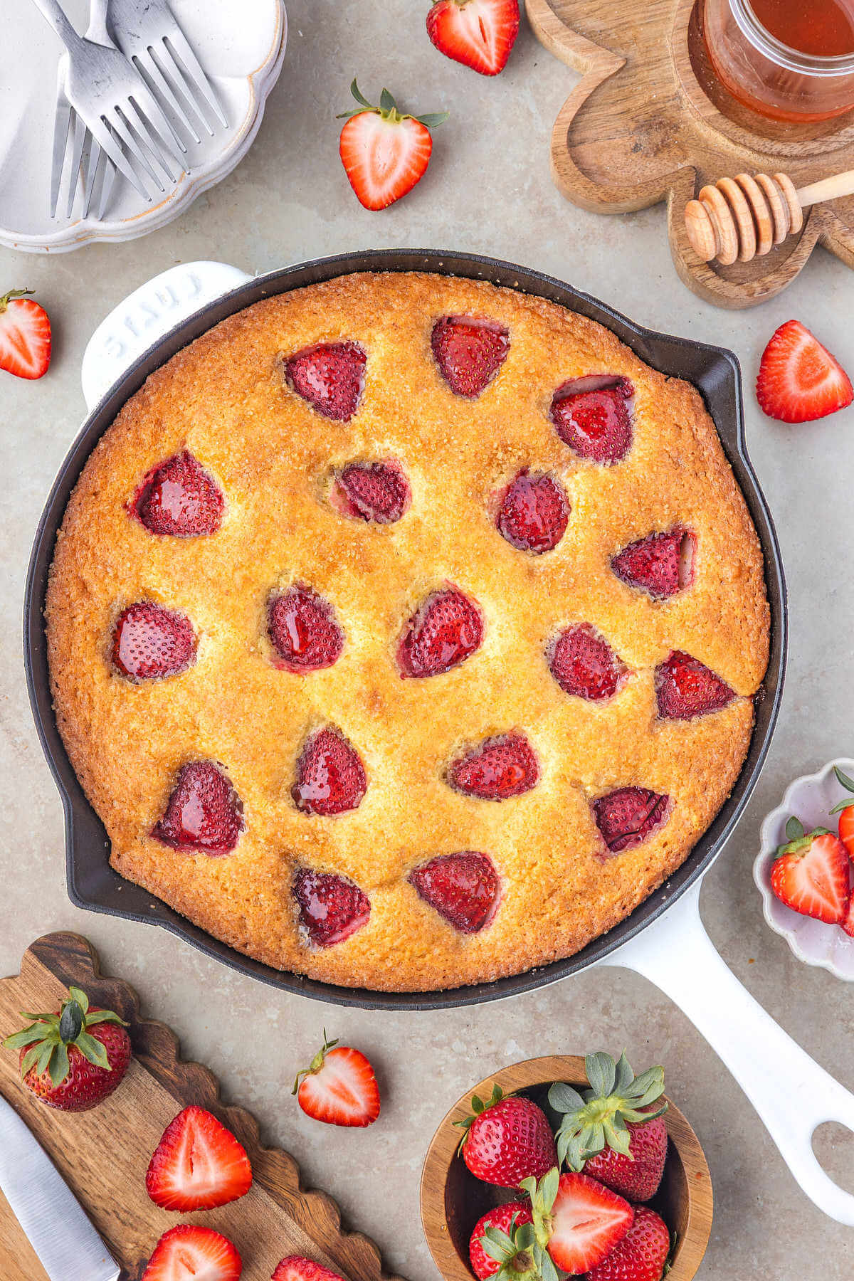 Sourdough strawberry cake in a skillet.