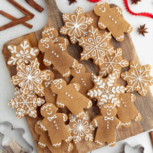 Sourdough gingerbread cookies on a wooden board.