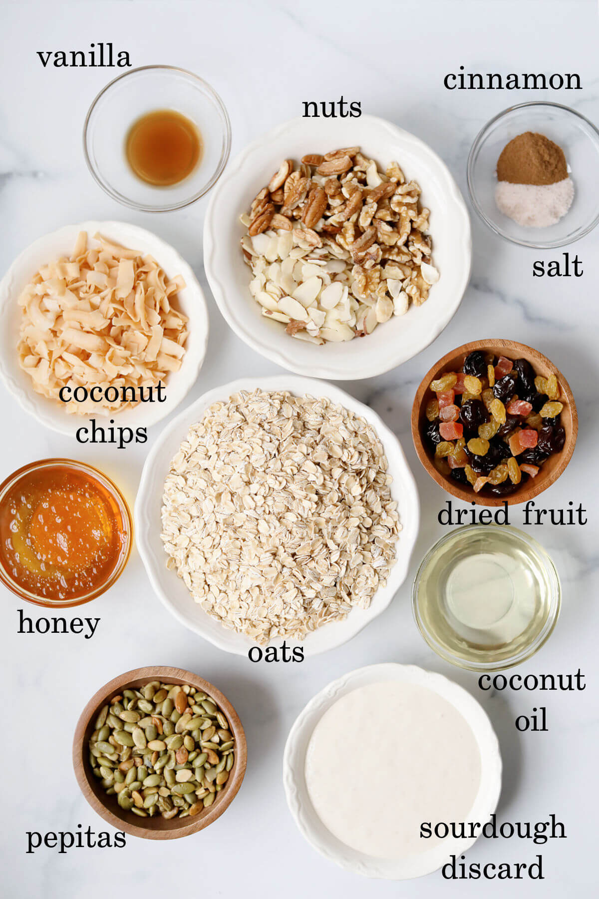 Ingredients in small bowls with text overlay labeling each ingredient.