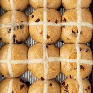 top down view of a 9 x 13 pan of sourdough hot cross buns