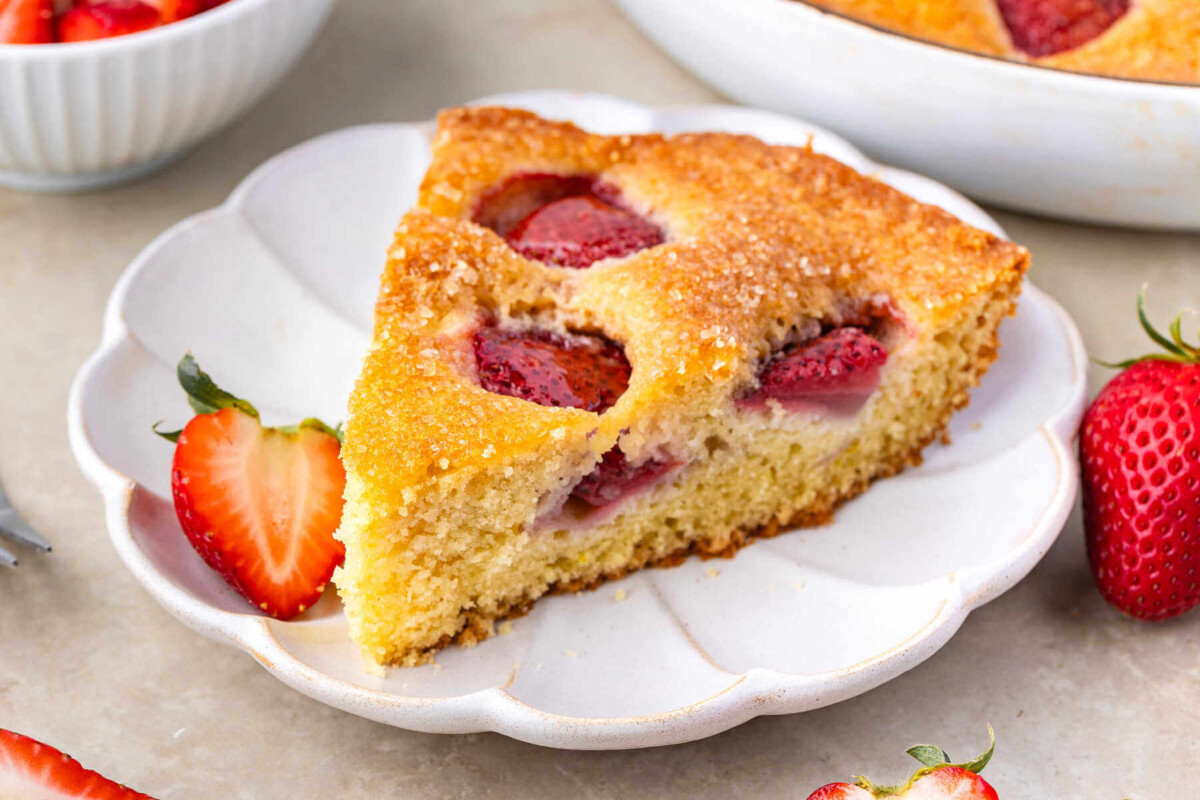 Slice of sourdough strawberry cake on a plate.