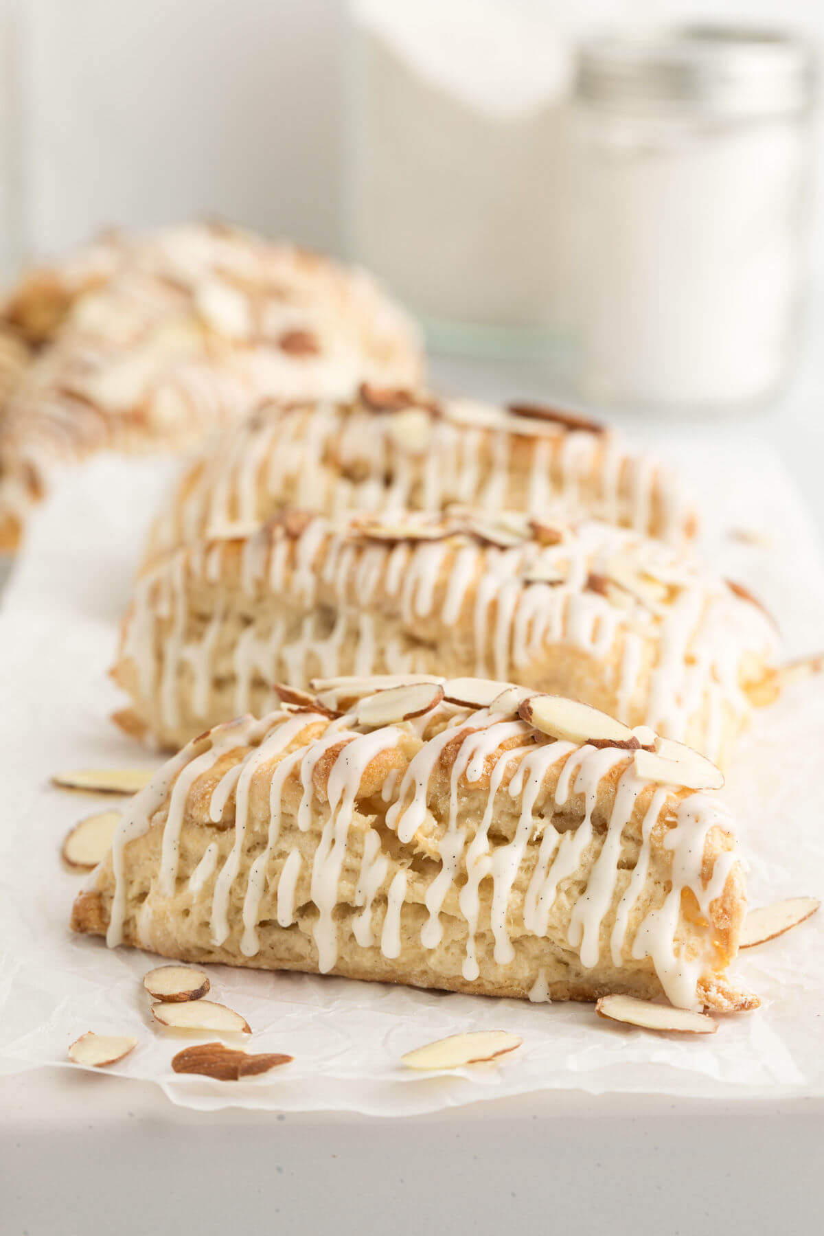 sourdough vanilla almond scones on a white tray