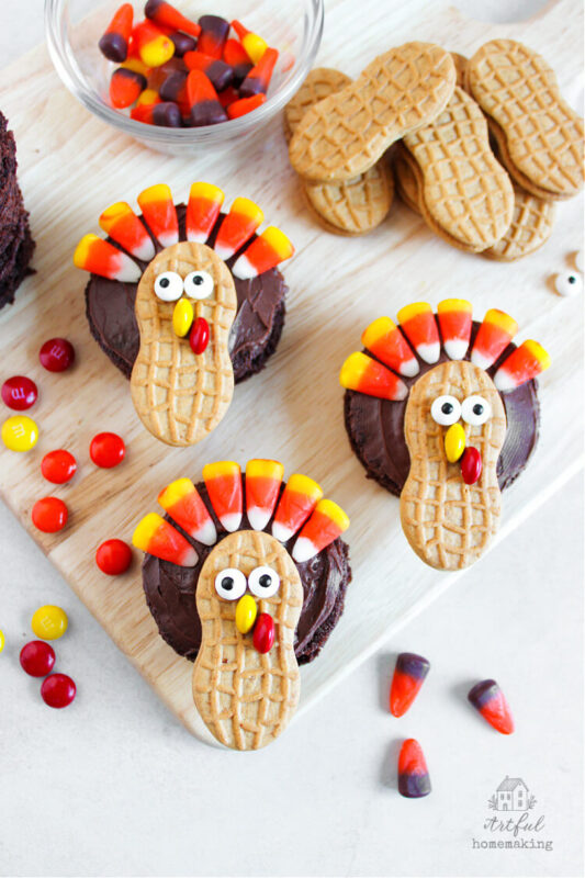 Thanksgiving turkey brownies on a wooden cutting board