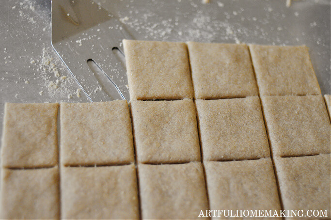 Sourdough crackers that have been baked on a baking sheet.